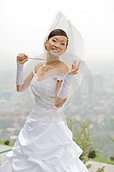 Bride with umbrella