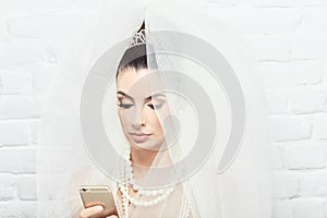 Bride using mobilephone