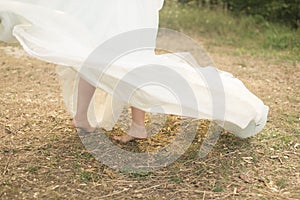Bride walking barefoot