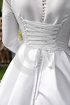 Bride wearing beautiful wedding dress, closeup view