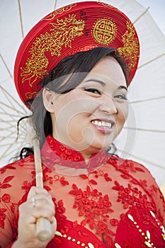 Bride wearing Vietnamese Ao Dai