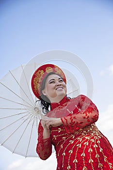 Bride wearing Vietnamese Ao Dai