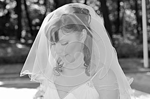 Bride wearing white veil