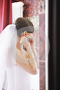 Bride wears earring