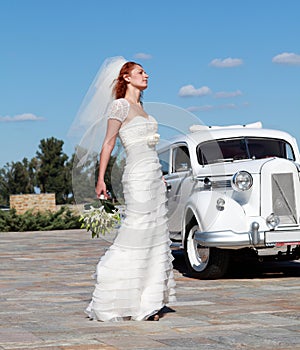 The bride and the wedding car