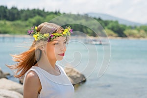 Bride with wedding crown and bouquet of seashels