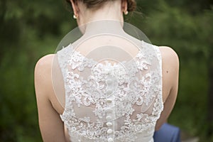 Bride and wedding dress detail