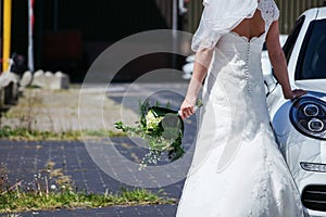 Bride in Wedding Dress going on the honeymoon