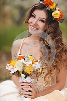 Bride in wedding dress in the Park in the spring.