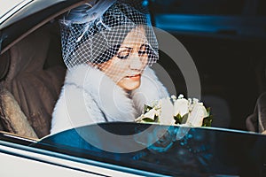 Bride in white car