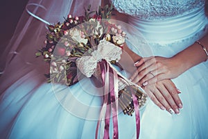 Bride in White Dress Holding Splendid Bridal Boquet