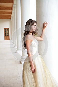 Bride in white-golden gown