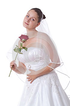 Bride in white with red rose