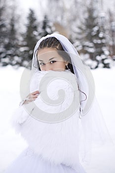 Bride in the winter forest