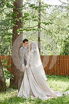 Bride woman and groom register their marriage. Wedding in nature. Love forever