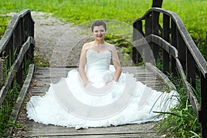 Bride on wooden bridge