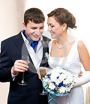 Bridegroom and bride with champagne