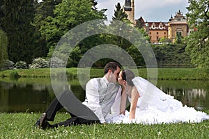 Bridegroom and bride on the wedding in park