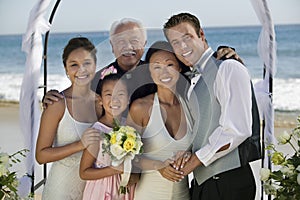 BrideGroom with family at beach wedding