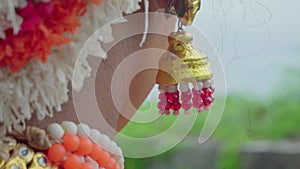 A brides erring swaying in wind slowly