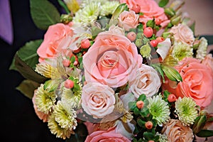 Brides wedding bouquet with wedding rings