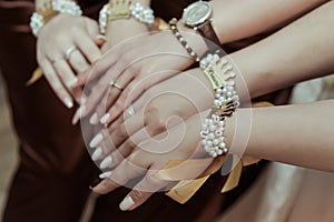 Bridesmaid closeup hands with bows