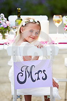 Bridesmaid Enjoying Meal At Wedding Reception