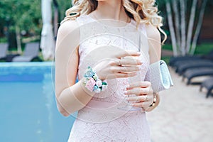 Bridesmaid with a glass of champagne. Alcoholic drinks at the reception after wedding ceremony