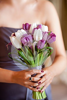 Bridesmaid holding a bouquet of flowers