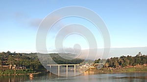 Bridge across And mist in the morning on the River, Sangkhla Buri,Kanchanaburi, Thailand.