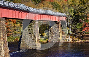 Bridge Across River in Autumn