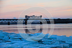 Bridge across river Dnieper at sunset in Kremenchug, Ukraine