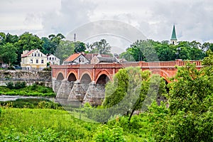 Bridge across the River Venta in the city of Kuldiga photo