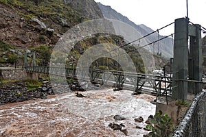 Bridge across the Urubamba river at the start of the Inca Trail to Machu Picchu. Cusco, Peru