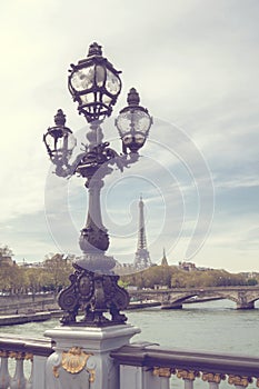 Bridge of Alexandre III against the Eiffel Tower in Paris, France.