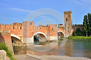 Bridge with archs Castelvecchio over river Adige in Verona Italy