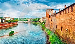 Bridge with archs Castelvecchio over river Adige