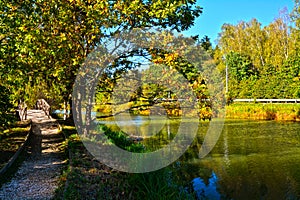 Bridge on the Bank of the Vorya river in the forest in the Abramtsevo estate, Moscow region, Russia