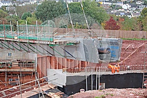 Bridge beam being lowered by a crane