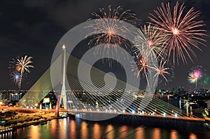 A bridge with Beautiful Fireworks for celebration at twilight ti