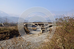 Bridge broken in 5.12 Wenchuan earthquake over dried riverway photo