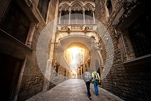 Bridge between buildings in Barri Gotic quarter of Barcelona