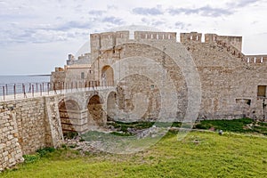 The bridge and Castello Maniace citadel in Siracusa, Sicily, Italy in sunny day