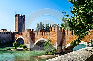 Bridge of Castelvecchio with arches over river Adige in Verona, Italy.
