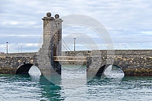 Bridge with Castle Doors Puente de Las Bolas of the Castle of photo