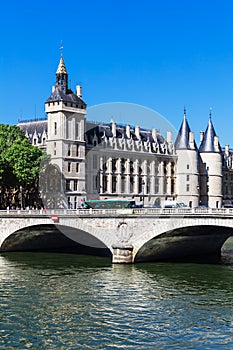 Bridge of Change over river Seine and Conciergerie Castle. Paris