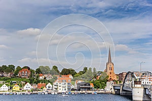 Bridge, church tower and houses at the quay of Sonderborg