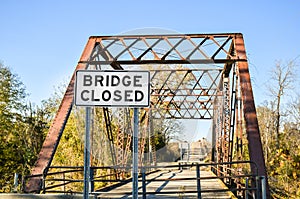 Bridge closed sign on an old bridge