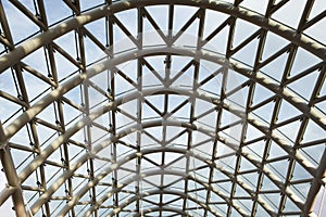 Bridge construction. Metal mesh framework of bridge