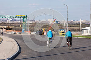 bridge construction and road signs with cyclists